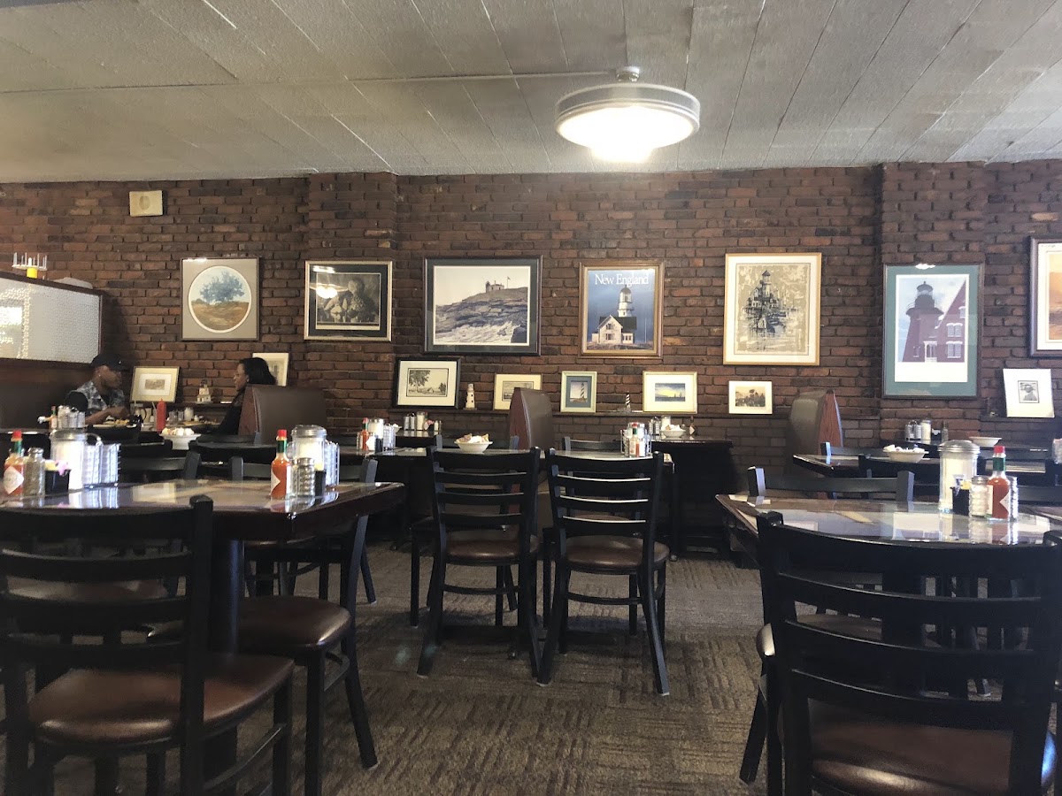 Warm, inviting dining room inside The Beacon Restaurant in downtown Wichita
